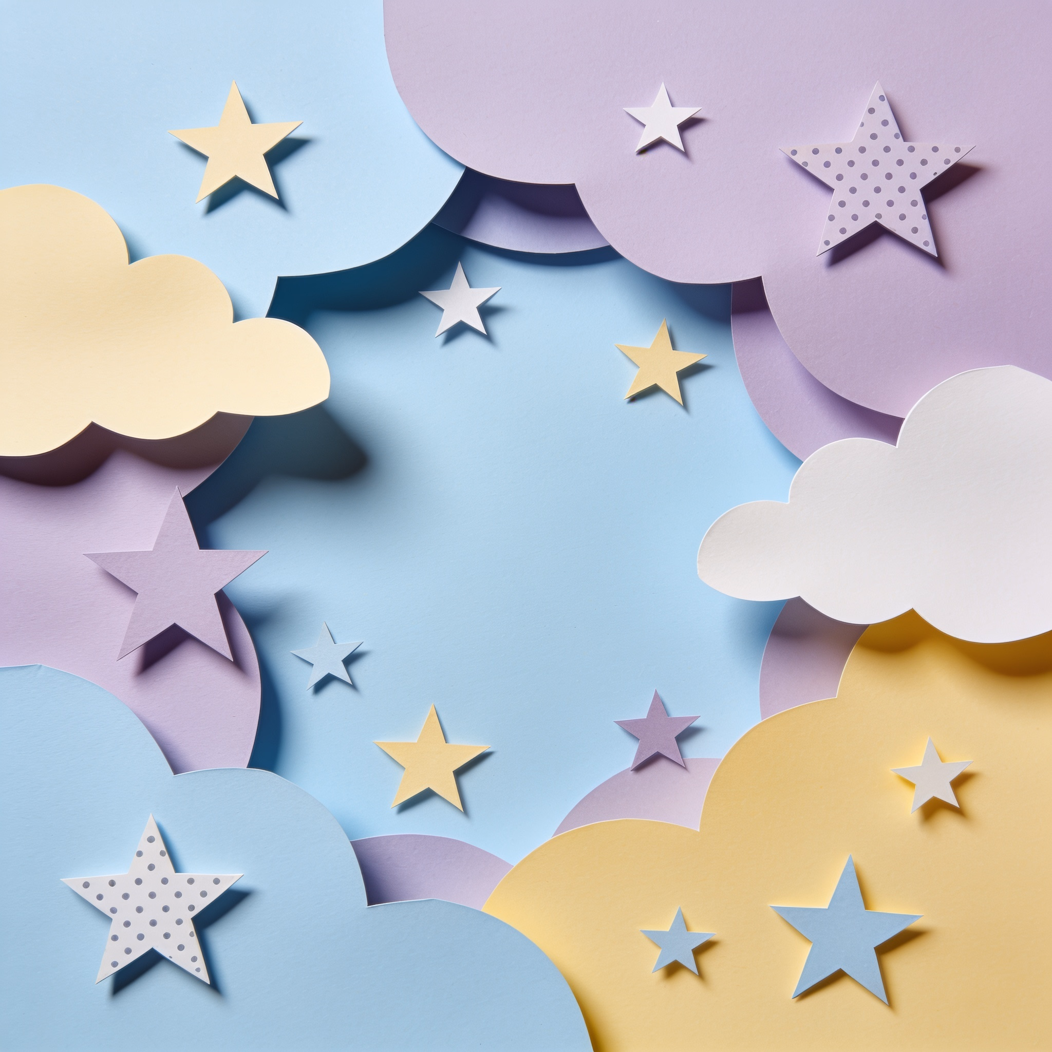 Design a logo using a papercut collage style for a fictional children's book publisher called Storybook Dreams. Incorporate whimsical elements like stars and clouds to evoke imagination and wonder.